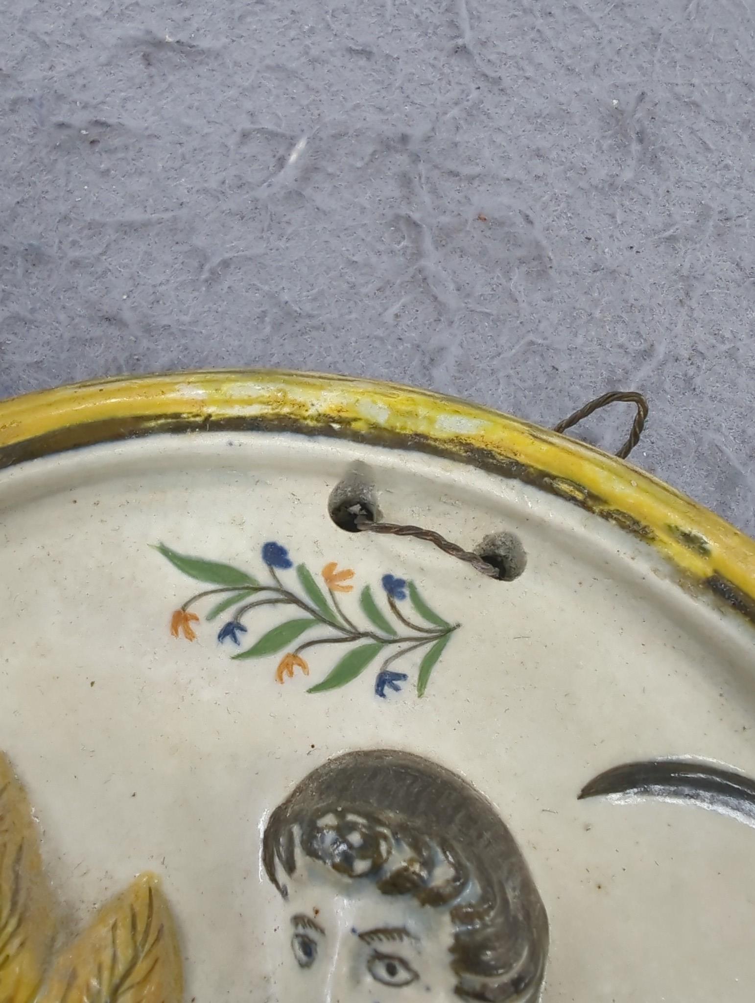 A late 18th century creamware Autumn oval plaque, 32.5cm long